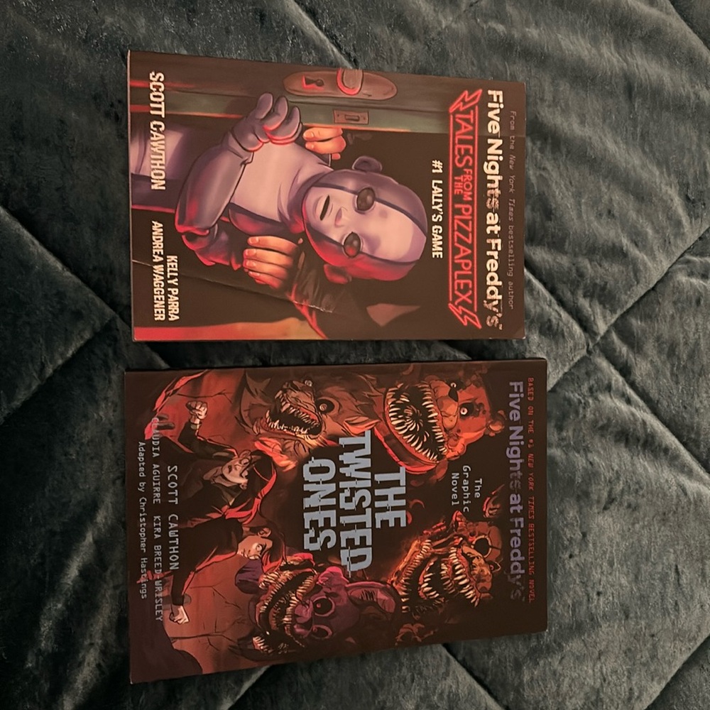 2 Books, both are from the Five Nights at Freddy’s book series.